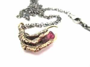 bronze crow claw and pink tourmaline pendant upclose